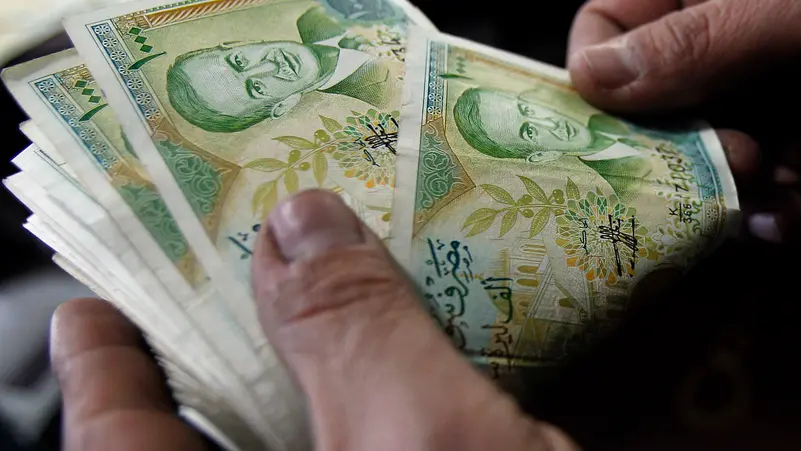 الليرة السورية ترتفع أمام الدولار الليرة السورية